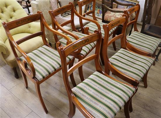 A set of six Regency style inlaid mahogany dining chairs (four and two carvers)